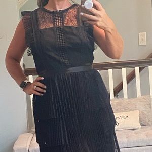 Black dress. Very flattering. Size L.